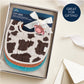 Itzy Muslin Bibs Cow Print
